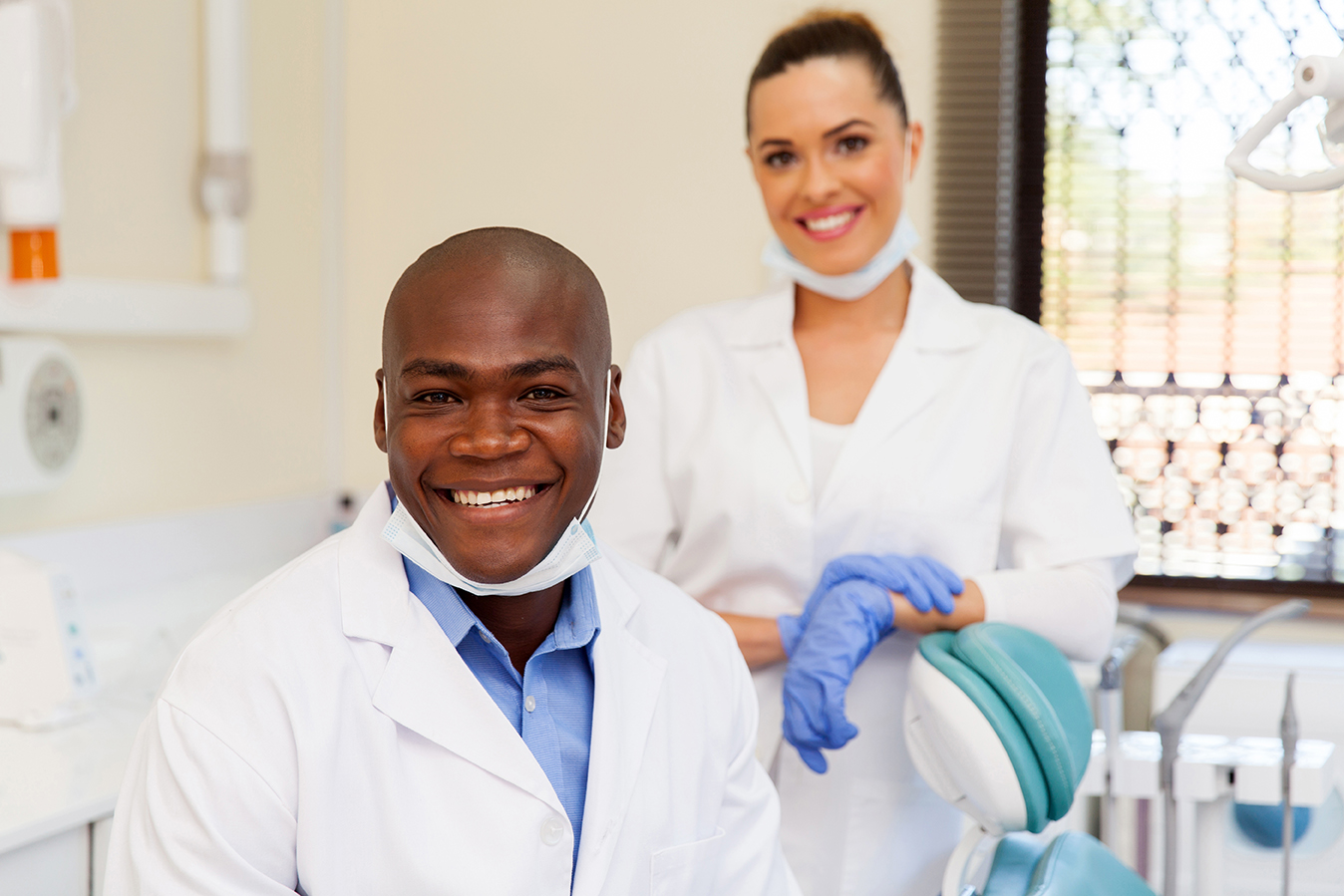 african dentist and assistant portrait of african dentist and assistant